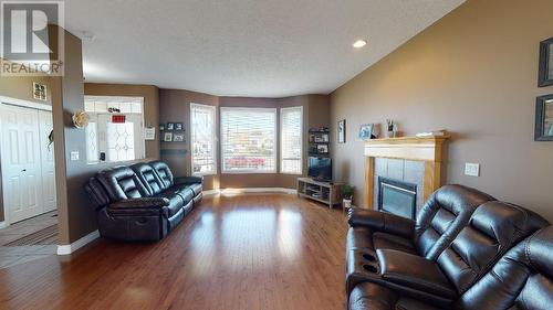 9912 114A Avenue, Fort St. John, BC - Indoor Photo Showing Living Room With Fireplace