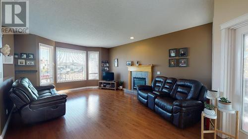 9912 114A Avenue, Fort St. John, BC - Indoor Photo Showing Living Room With Fireplace