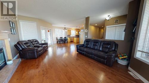 9912 114A Avenue, Fort St. John, BC - Indoor Photo Showing Living Room With Fireplace