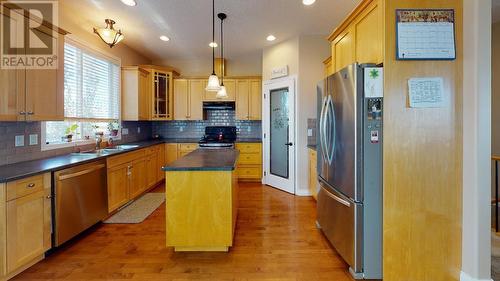 9912 114A Avenue, Fort St. John, BC - Indoor Photo Showing Kitchen With Stainless Steel Kitchen With Double Sink