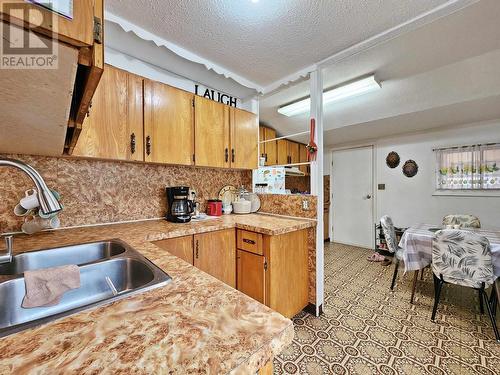 436 Vaughan Street, Quesnel, BC - Indoor Photo Showing Kitchen With Double Sink