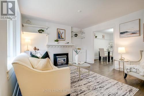 303 Forman Avenue, Toronto, ON - Indoor Photo Showing Living Room With Fireplace