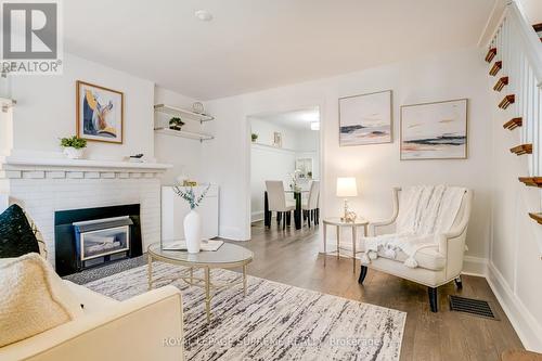 303 Forman Avenue, Toronto, ON - Indoor Photo Showing Living Room With Fireplace