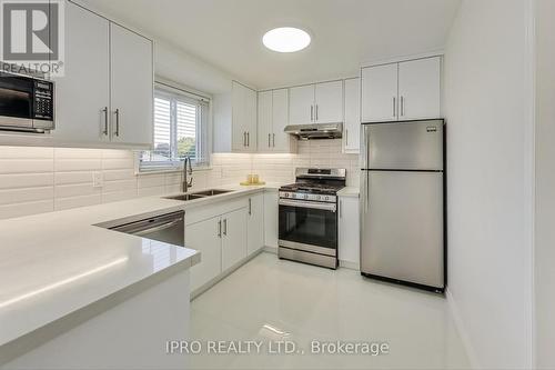 61 Geneva Crescent, Brampton, ON - Indoor Photo Showing Kitchen With Double Sink