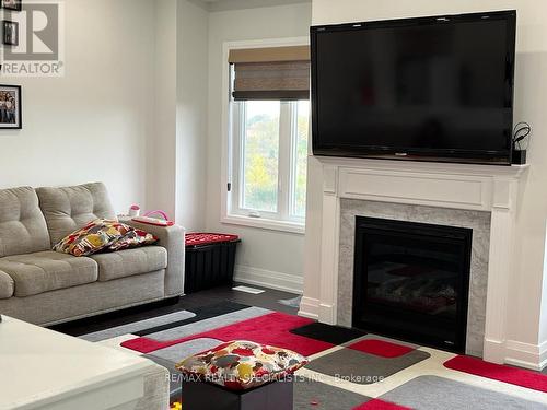 112 Brushwood Drive, Brampton, ON - Indoor Photo Showing Living Room With Fireplace