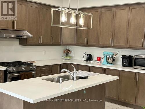 112 Brushwood Drive, Brampton, ON - Indoor Photo Showing Kitchen With Double Sink