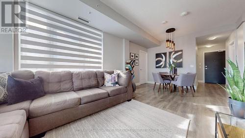 1102 - 65 Yorkland Boulevard, Brampton, ON - Indoor Photo Showing Living Room