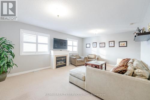 8 Levida Street, Brampton (Vales Of Castlemore), ON - Indoor Photo Showing Living Room With Fireplace