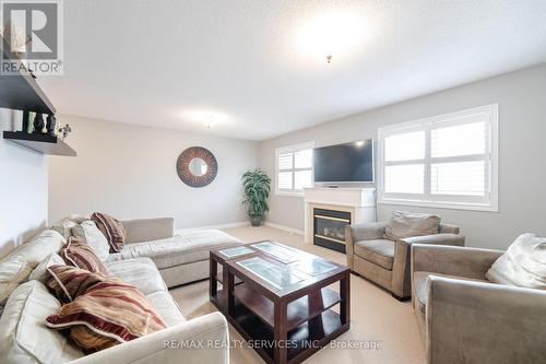 8 Levida Street, Brampton (Vales Of Castlemore), ON - Indoor Photo Showing Living Room With Fireplace