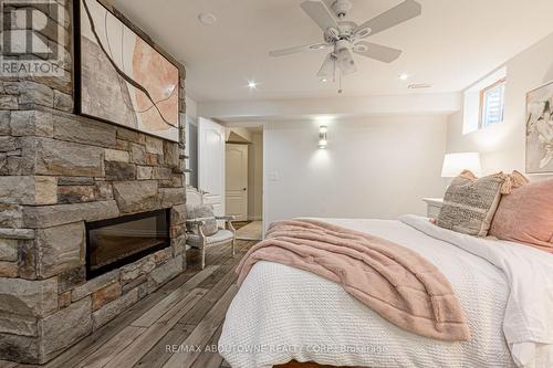 1227 Nathaniel Crescent, Burlington, ON - Indoor Photo Showing Bedroom With Fireplace