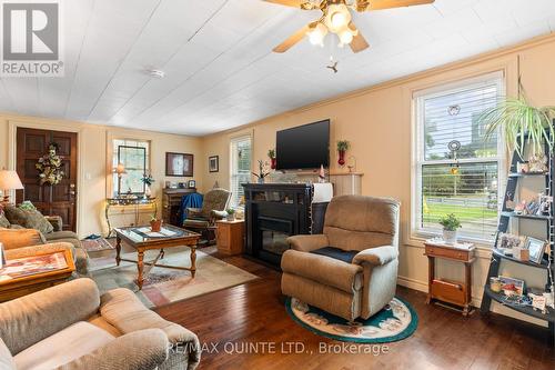 83 County 3, Prince Edward County (Ameliasburgh), ON - Indoor Photo Showing Living Room With Fireplace