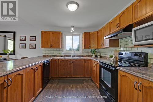 99 Willow Glen Drive, Kawartha Lakes (Lindsay), ON - Indoor Photo Showing Kitchen With Double Sink