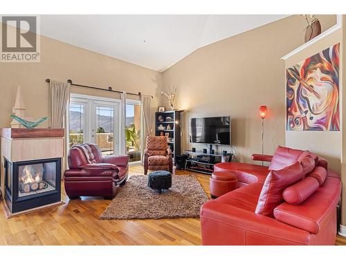 6097 Beatrice Road, Peachland, BC - Indoor Photo Showing Living Room With Fireplace