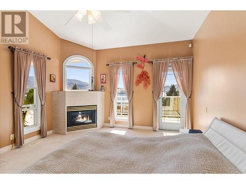 6097 Beatrice Road, Peachland, BC - Indoor Photo Showing Living Room With Fireplace