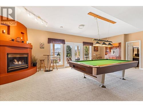 6097 Beatrice Road, Peachland, BC - Indoor Photo Showing Other Room With Fireplace