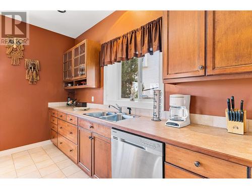 6097 Beatrice Road, Peachland, BC - Indoor Photo Showing Kitchen With Double Sink