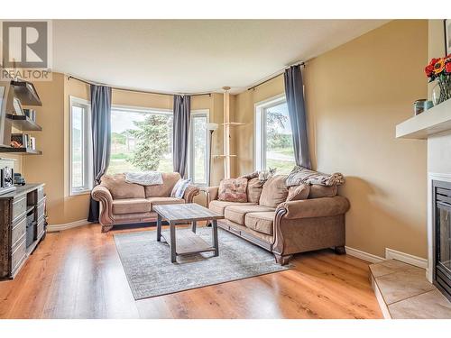 6111 Bella Vista Road Lot# 8, Vernon, BC - Indoor Photo Showing Living Room With Fireplace