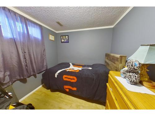 1213 10Th Avenue S, Cranbrook, BC - Indoor Photo Showing Bedroom