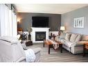 1213 10Th Avenue S, Cranbrook, BC  - Indoor Photo Showing Living Room With Fireplace 