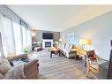 1213 10Th Avenue S, Cranbrook, BC  - Indoor Photo Showing Living Room With Fireplace 