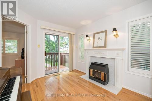 9 Briarwood Drive, New Tecumseth, ON - Indoor Photo Showing Living Room With Fireplace