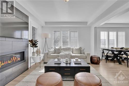 425 Riverboat Heights, Ottawa, ON - Indoor Photo Showing Living Room With Fireplace