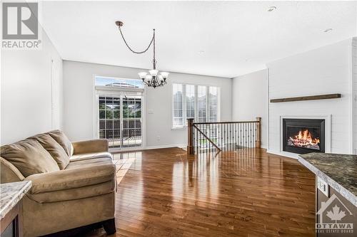 406 Blackleaf Drive, Ottawa, ON - Indoor Photo Showing Living Room With Fireplace