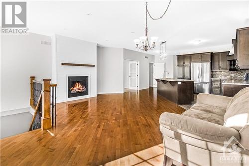 406 Blackleaf Drive, Ottawa, ON - Indoor Photo Showing Living Room With Fireplace