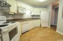 306 57 Russell Drive, Yorkton, SK  - Indoor Photo Showing Kitchen With Double Sink 