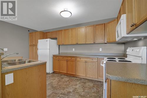 301 6345 Rochdale Boulevard, Regina, SK - Indoor Photo Showing Kitchen With Double Sink