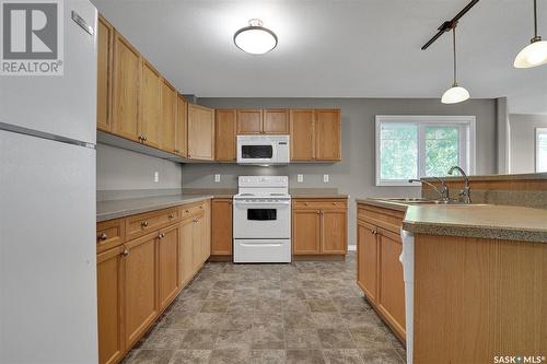 301 6345 Rochdale Boulevard, Regina, SK - Indoor Photo Showing Kitchen