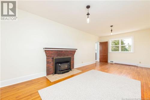 50 Fairfield Road, Sackville, NB - Indoor Photo Showing Living Room With Fireplace