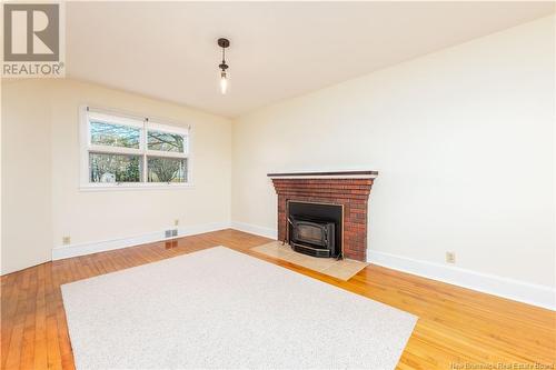 50 Fairfield Road, Sackville, NB - Indoor Photo Showing Living Room With Fireplace