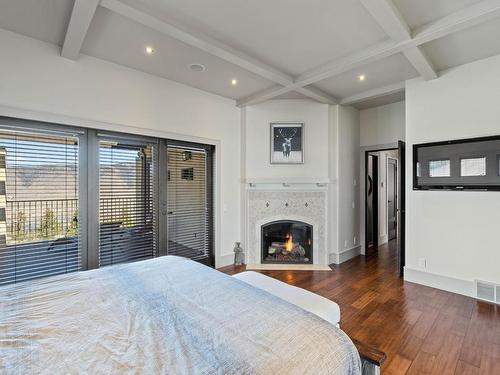 1709 Cheakamus Drive, Kamloops, BC - Indoor Photo Showing Bedroom With Fireplace