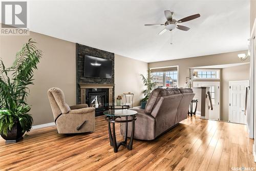 7902 Gordon Staseson Boulevard, Regina, SK - Indoor Photo Showing Living Room With Fireplace