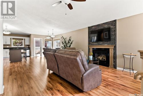 7902 Gordon Staseson Boulevard, Regina, SK - Indoor Photo Showing Living Room With Fireplace