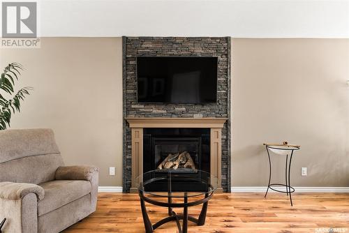 7902 Gordon Staseson Boulevard, Regina, SK - Indoor Photo Showing Living Room With Fireplace