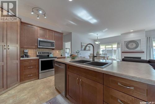 16 1590 4Th Avenue Nw, Moose Jaw, SK - Indoor Photo Showing Kitchen With Double Sink