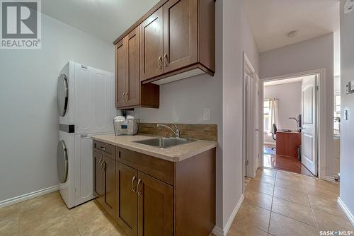 16 1590 4Th Avenue Nw, Moose Jaw, SK - Indoor Photo Showing Laundry Room