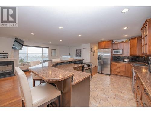 6611 Cameo Drive Lot# 16, Vernon, BC - Indoor Photo Showing Kitchen With Fireplace With Stainless Steel Kitchen