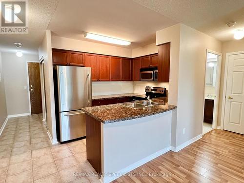 201 - 4889 Kimbermount Avenue, Mississauga, ON - Indoor Photo Showing Kitchen With Double Sink