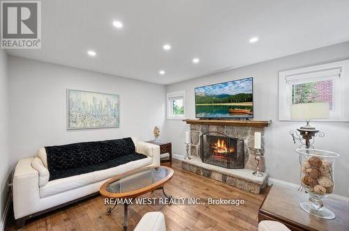 4021 Mahogany Row, Mississauga (Rathwood), ON - Indoor Photo Showing Living Room With Fireplace