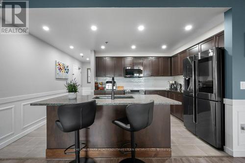 423 - 1440 Gordon Street, Guelph (Pine Ridge), ON - Indoor Photo Showing Kitchen With Upgraded Kitchen