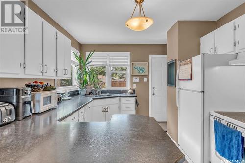 352 Forget Street, Regina, SK - Indoor Photo Showing Kitchen With Double Sink