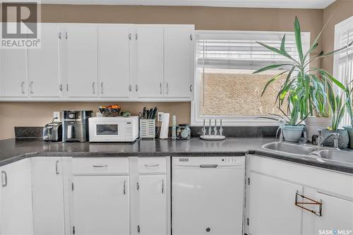 352 Forget Street, Regina, SK - Indoor Photo Showing Kitchen With Double Sink