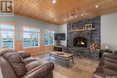 6 Joanette Drive, Leask Rm No. 464, SK - Indoor Photo Showing Living Room With Fireplace