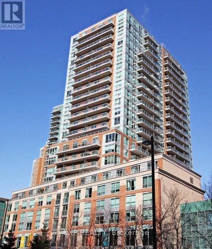 226 - 50 Lynn Williams Street, Toronto (Niagara), ON - Outdoor With Balcony With Facade