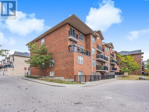 305 - 35 Strangford Lane, Toronto (Clairlea-Birchmount), ON - Outdoor With Balcony