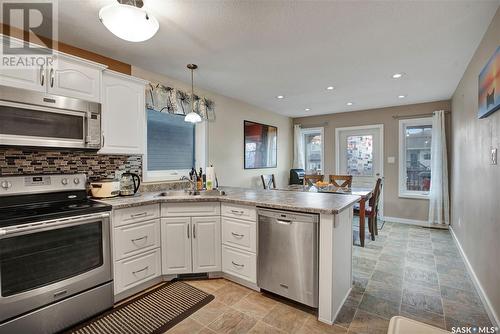 320 Haichert Street, Warman, SK - Indoor Photo Showing Kitchen With Double Sink