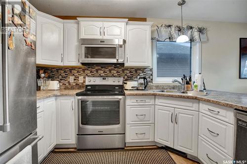 320 Haichert Street, Warman, SK - Indoor Photo Showing Kitchen With Double Sink